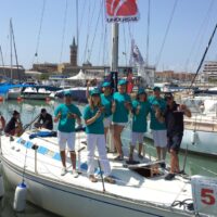 Equipaggio della Stingerporta in regata CivitanovaMarche-Sebenicco campagna Mondo libero dalla droga